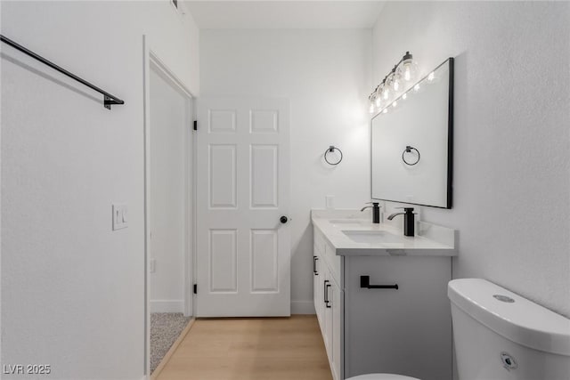 3318 N Decatur Blvd Unit 1020, Las Vegas, NV 89130 - bathroom with toilet, vanity, and wood finished floors