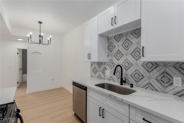 3318 N Decatur Blvd Unit 1020, Las Vegas, NV 89130 - kitchen featuring dishwasher, a sink, range, a chandelier, and light wood-style flooring