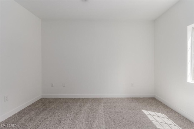 3318 N Decatur Blvd Unit 1020, Las Vegas, NV 89130 - unfurnished room with light colored carpet and baseboards