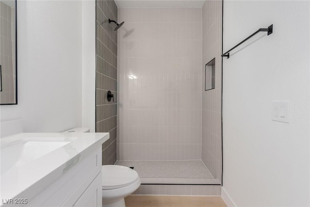 3318 N Decatur Blvd Unit 1020, Las Vegas, NV 89130 - full bathroom featuring toilet, a tile shower, and vanity