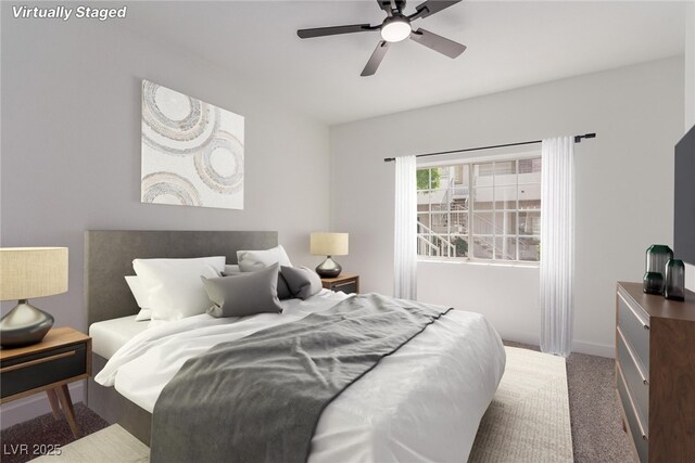 3318 N Decatur Blvd Unit 1020, Las Vegas, NV 89130 - carpeted bedroom featuring baseboards and a ceiling fan