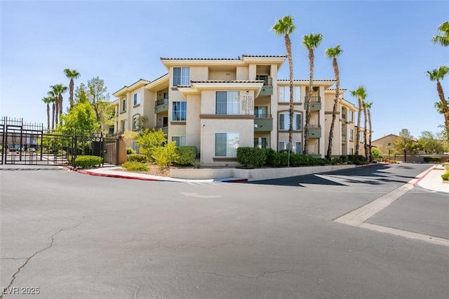 7151 S Durango Dr Unit 211, Las Vegas, NV 89113 - view of property featuring a residential view