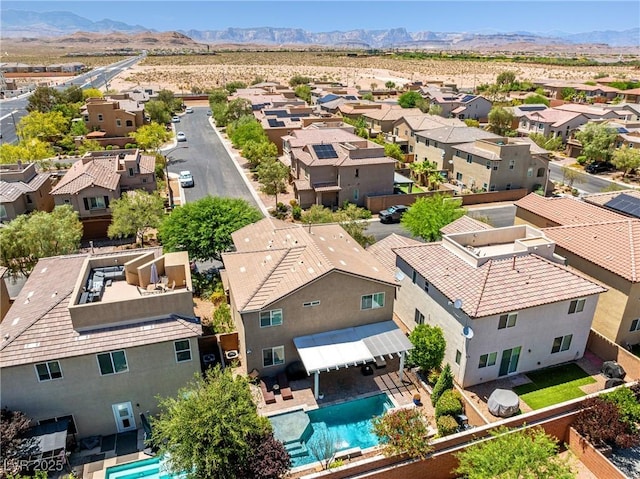 10474 Palmadora St, Las Vegas, NV 89178 - aerial perspective of suburban area featuring a pool and a mountain backdrop