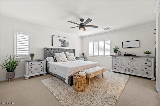 10474 Palmadora St, Las Vegas, NV 89178 - bedroom with crown molding, light colored carpet, a ceiling fan, and baseboards