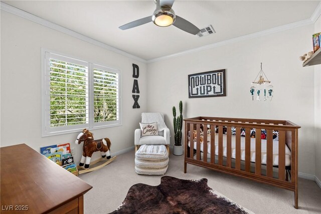 10474 Palmadora St, Las Vegas, NV 89178 - bedroom featuring carpet flooring, ornamental molding, a nursery area, baseboards, and ceiling fan