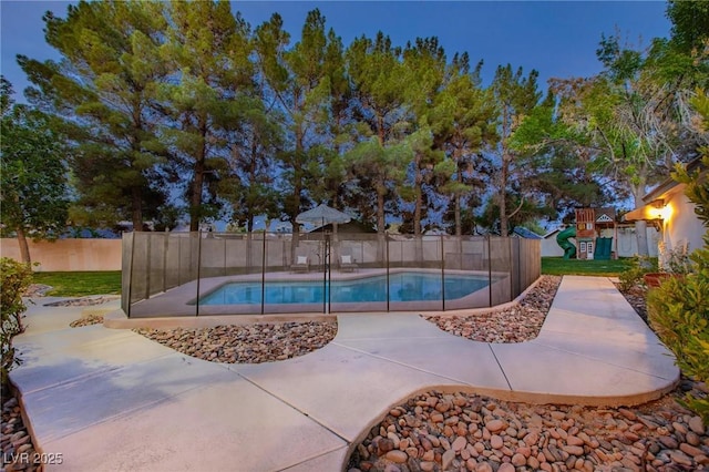 15 Pheasant Ridge Dr, Henderson, NV 89014 - view of swimming pool featuring a fenced backyard and a playground
