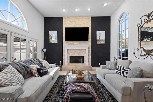 15 Pheasant Ridge Dr, Henderson, NV 89014 - living area with recessed lighting, wood finished floors, and a stone fireplace
