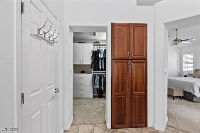 15 Pheasant Ridge Dr, Henderson, NV 89014 - walk in closet featuring light carpet and ceiling fan