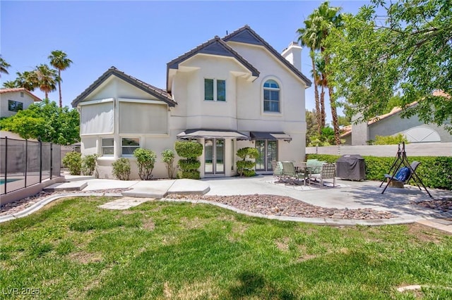 15 Pheasant Ridge Dr, Henderson, NV 89014 - rear view of property with french doors, a patio, and stucco siding