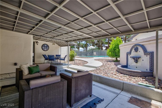 15 Pheasant Ridge Dr, Henderson, NV 89014 - fenced backyard featuring a patio area, outdoor dining space, and an outdoor living space
