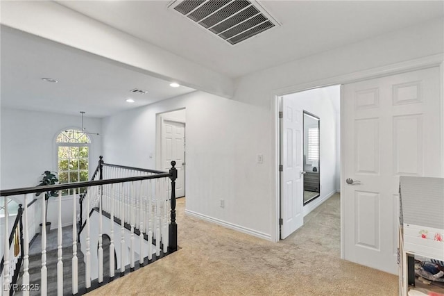 15 Pheasant Ridge Dr, Henderson, NV 89014 - hallway with an upstairs landing, light colored carpet, recessed lighting, and baseboards