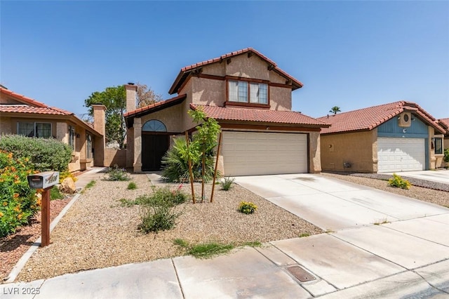 6436 Deadwood Rd, Las Vegas, NV 89108 - view of front of house featuring stucco siding, a tiled roof, driveway, a chimney, and a garage