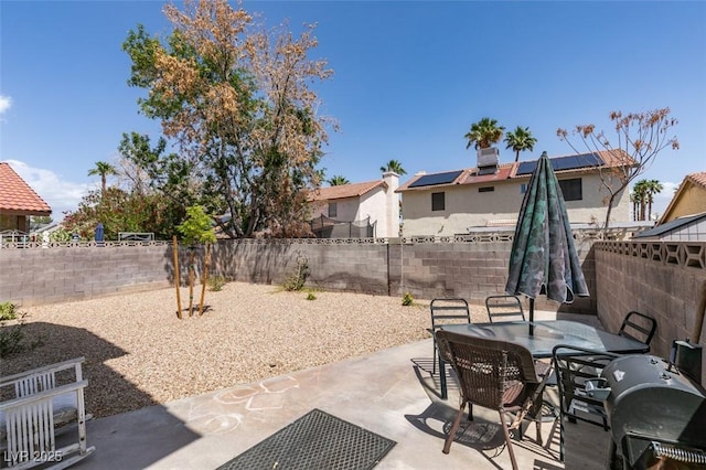 6436 Deadwood Rd, Las Vegas, NV 89108 - fenced backyard featuring outdoor dining area and a patio