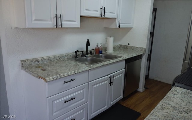 3441 Villa Way, Las Vegas, NV 89120 - kitchen featuring dishwasher, dark wood-style floors, white cabinets, and light countertops
