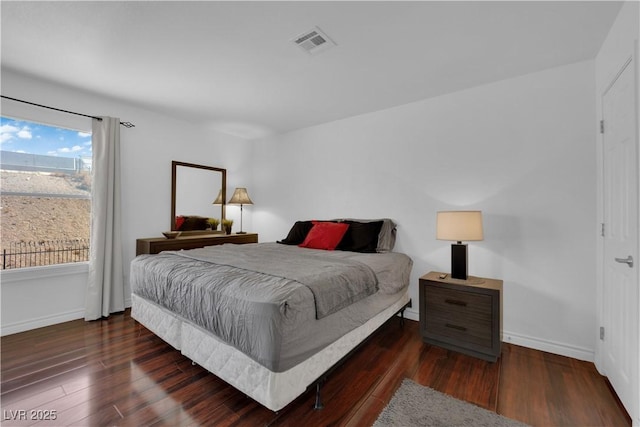 2451 N Rainbow Blvd Unit 2043, Las Vegas, NV 89108 - bedroom featuring wood finished floors and baseboards