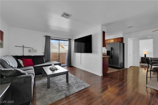 2451 N Rainbow Blvd Unit 2043, Las Vegas, NV 89108 - living room with dark wood-type flooring and baseboards