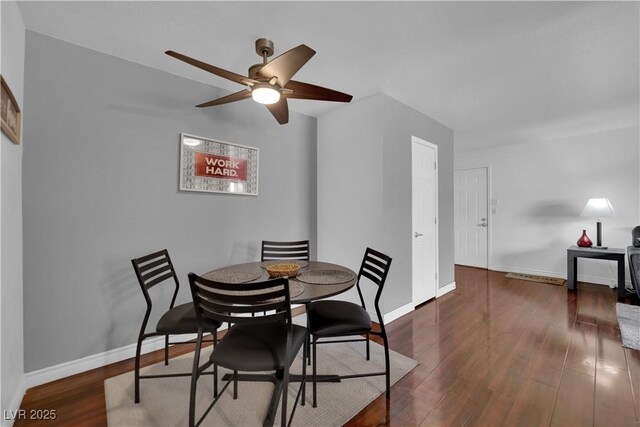 2451 N Rainbow Blvd Unit 2043, Las Vegas, NV 89108 - dining area with a ceiling fan and wood finished floors