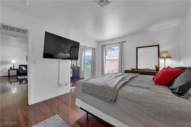 2451 N Rainbow Blvd Unit 2043, Las Vegas, NV 89108 - bedroom featuring wood finished floors and baseboards