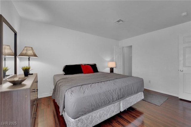 2451 N Rainbow Blvd Unit 2043, Las Vegas, NV 89108 - bedroom featuring wood finished floors and baseboards
