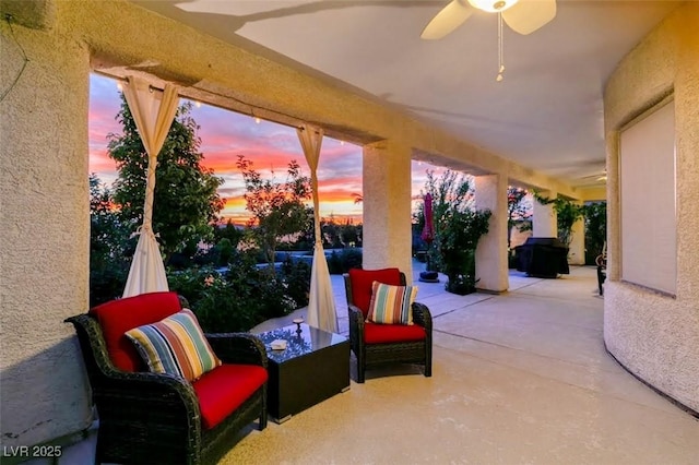 8221 Bay Dunes St, Las Vegas, NV 89131 - patio terrace at dusk with a patio area and a ceiling fan