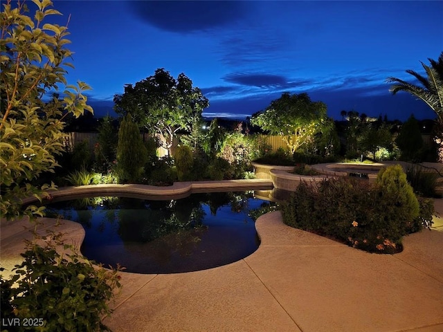 8221 Bay Dunes St, Las Vegas, NV 89131 - view of swimming pool with a fenced backyard and an in-ground hot tub