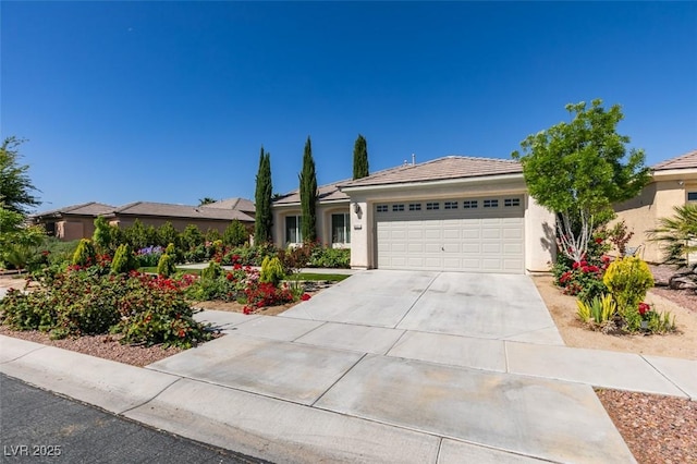 8221 Bay Dunes St, Las Vegas, NV 89131 - view of front of house featuring a garage, stucco siding, driveway, and a tiled roof