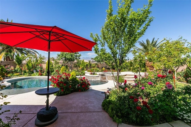 8221 Bay Dunes St, Las Vegas, NV 89131 - view of pool featuring a fenced backyard, a patio area, and an in-ground hot tub