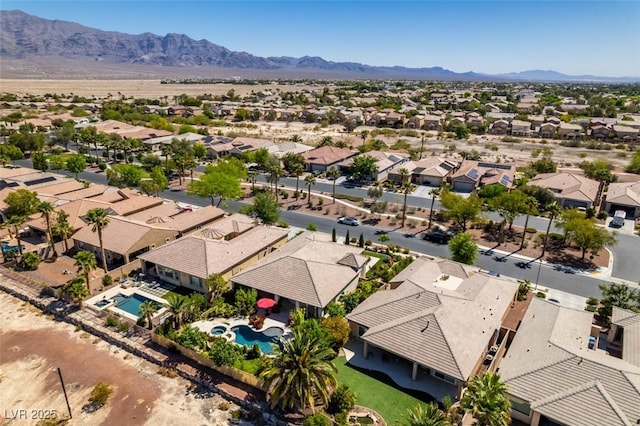 8221 Bay Dunes St, Las Vegas, NV 89131 - aerial perspective of suburban area featuring a pool and mountains