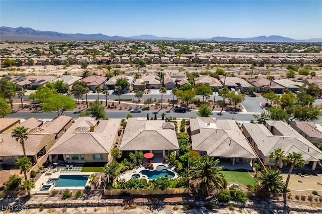 8221 Bay Dunes St, Las Vegas, NV 89131 - aerial view of residential area featuring a pool and mountains