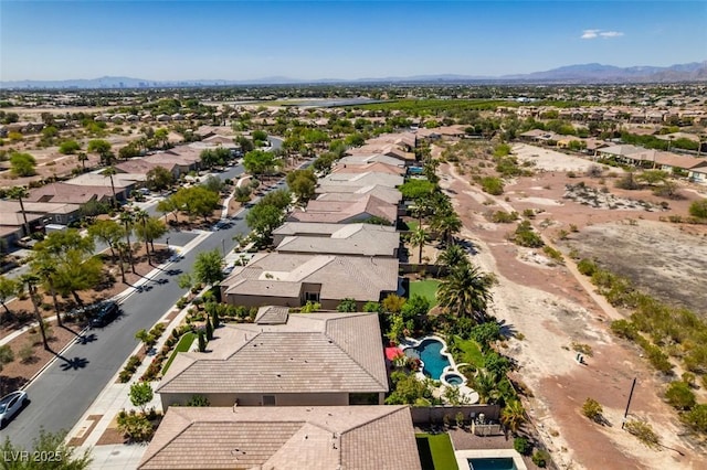 8221 Bay Dunes St, Las Vegas, NV 89131 - aerial view of residential area featuring a pool and a mountain backdrop