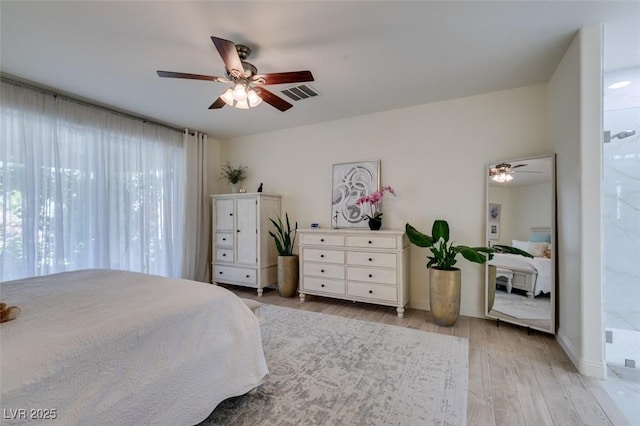 8221 Bay Dunes St, Las Vegas, NV 89131 - bedroom featuring light wood-type flooring, ceiling fan, and baseboards