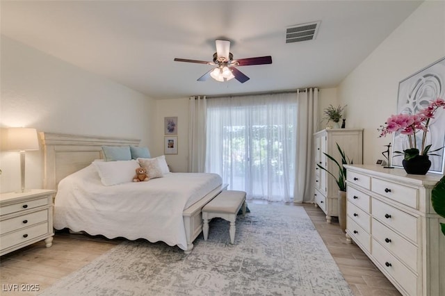 8221 Bay Dunes St, Las Vegas, NV 89131 - bedroom with light wood-style flooring and ceiling fan