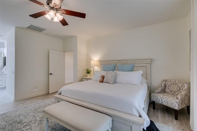 8221 Bay Dunes St, Las Vegas, NV 89131 - bedroom featuring light wood-style floors, a ceiling fan, and baseboards