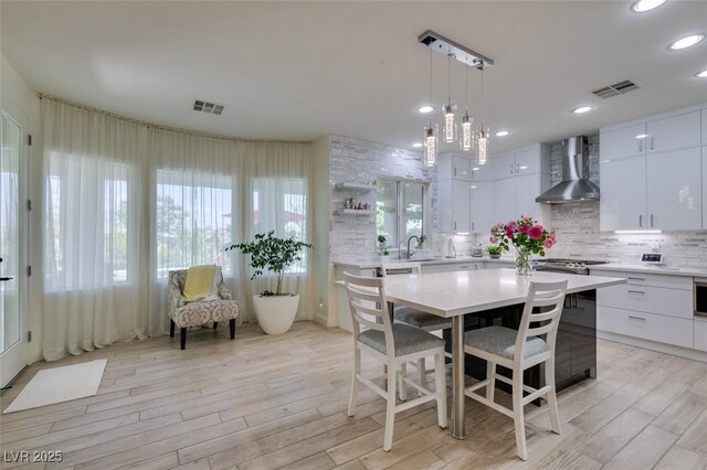8221 Bay Dunes St, Las Vegas, NV 89131 - dining space with light wood-type flooring and recessed lighting