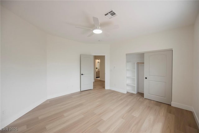 8104 Bay Harbor Dr, Las Vegas, NV 89128 - unfurnished bedroom with light wood-style flooring, baseboards, a closet, and ceiling fan