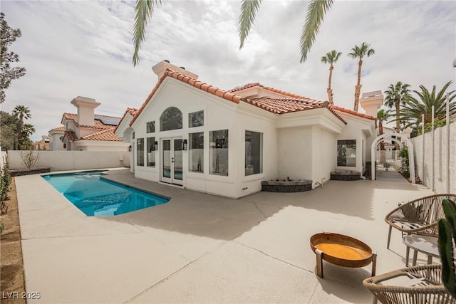 8104 Bay Harbor Dr, Las Vegas, NV 89128 - back of house featuring french doors, a patio, and stucco siding