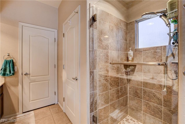 805 Palmero Way, Boulder City, NV 89005 - bathroom with a tile shower, vanity, and tile patterned flooring