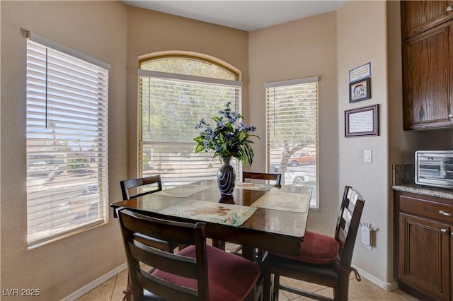 805 Palmero Way, Boulder City, NV 89005 - dining space with plenty of natural light, baseboards, light tile patterned floors, and a textured wall