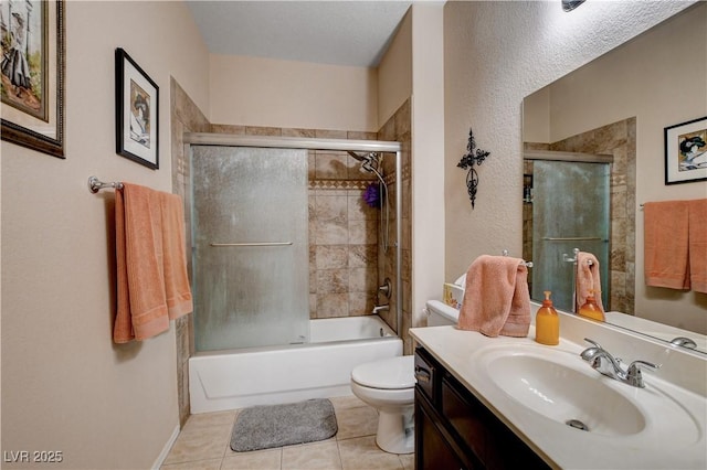 805 Palmero Way, Boulder City, NV 89005 - full bathroom featuring toilet, vanity, tile patterned flooring, and shower / bath combination with glass door