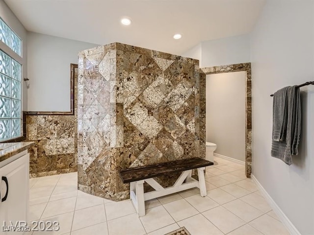 9718 Camino Capistrano Ln, Las Vegas, NV 89147 - bathroom featuring a walk in shower, toilet, tile patterned flooring, vanity, and recessed lighting