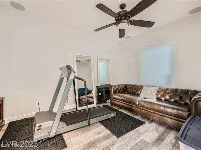 9718 Camino Capistrano Ln, Las Vegas, NV 89147 - living area featuring wood finished floors, a ceiling fan, and baseboards