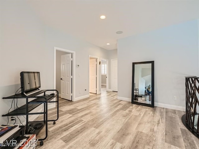 9718 Camino Capistrano Ln, Las Vegas, NV 89147 - living area featuring light wood finished floors, baseboards, and recessed lighting