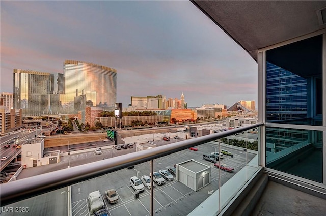 4525 Dean Martin Dr Unit 901, Las Vegas, NV 89103 - balcony at dusk featuring a view of city