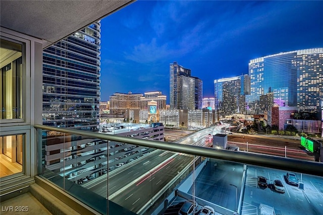 4525 Dean Martin Dr Unit 901, Las Vegas, NV 89103 - balcony at night featuring a view of city lights