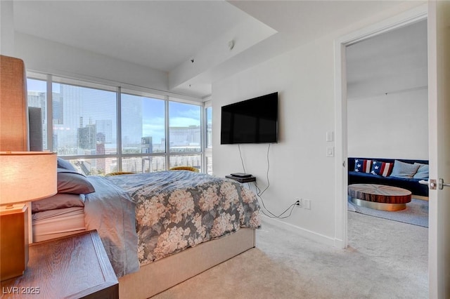 4525 Dean Martin Dr Unit 901, Las Vegas, NV 89103 - bedroom with multiple windows, carpet floors, and baseboards