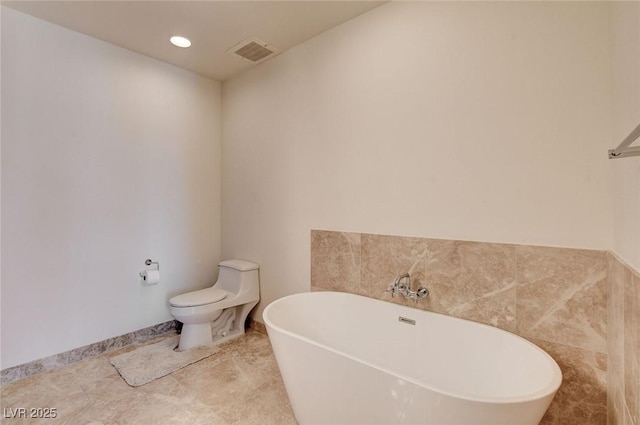 4525 Dean Martin Dr Unit 901, Las Vegas, NV 89103 - full bathroom featuring a soaking tub and toilet