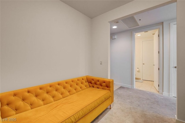 4525 Dean Martin Dr Unit 901, Las Vegas, NV 89103 - living area featuring light colored carpet, baseboards, and recessed lighting
