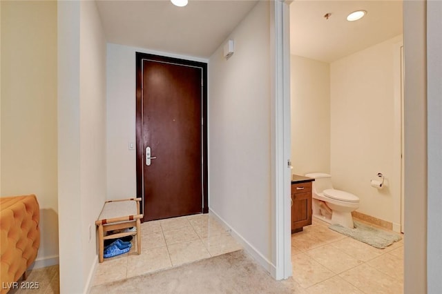4525 Dean Martin Dr Unit 901, Las Vegas, NV 89103 - doorway to outside with light tile patterned flooring, baseboards, and recessed lighting