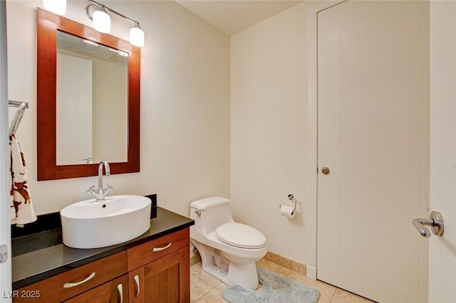 4525 Dean Martin Dr Unit 901, Las Vegas, NV 89103 - bathroom with vanity, toilet, and tile patterned floors