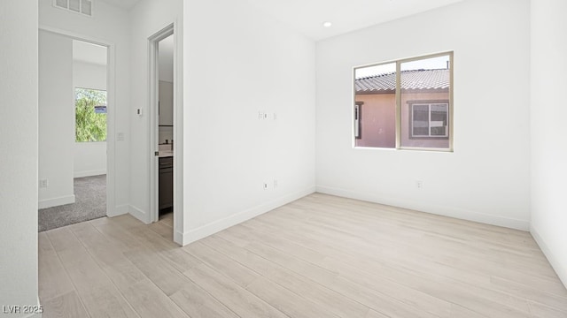 362 Tigullio Ave, Henderson, NV 89011 - empty room featuring light wood-style flooring, baseboards, and recessed lighting